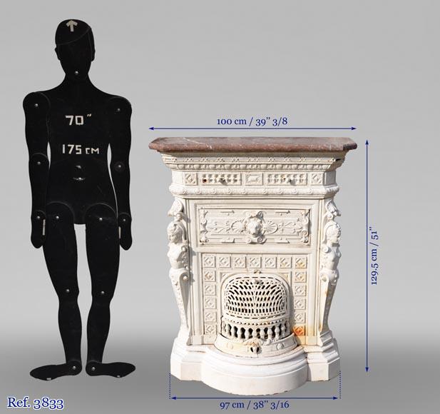 Antique cast iron stove in the Napoleon III style decorated with caryatids Antique cast iron stove in the Napoleon III style decorated with caryatids-11