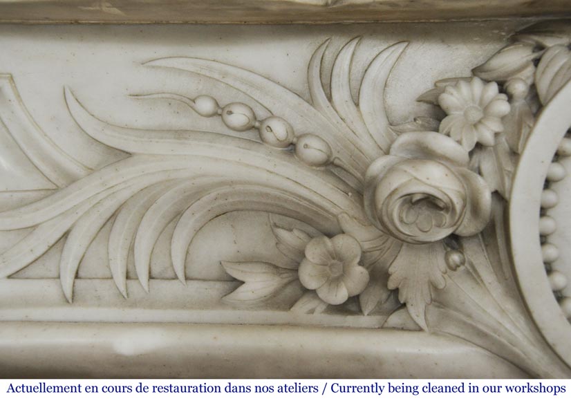 Antique Napoleon III fireplace with a woman's profile decoration in a medallion Antique Napoleon III fireplace with a woman's profile decoration in a medallion-4