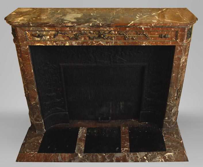 Antique Louis XVI style fireplace with round corners in Red from the North marble and gilded bronze ornaments Antique Louis XVI style fireplace with round corners in Red from the North marble and gilded bronze ornaments-0