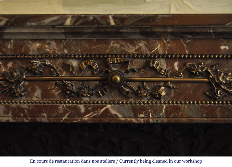 Antique Louis XVI style fireplace with round corners in Red from the North marble and gilded bronze ornaments Antique Louis XVI style fireplace with round corners in Red from the North marble and gilded bronze ornaments-1