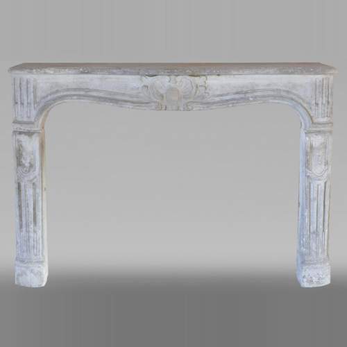 Antique Louis XV period fireplace in sculpted stone
