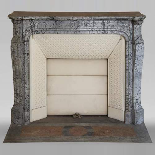 Antique Louis XV style curved Pompadour fireplace in Bleu Fleuri marble