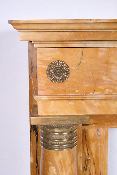 Empire style fireplace in Sienna yellow marble with columns and gilt bronze rosettes Empire style fireplace in Sienna yellow marble with columns and gilt bronze rosettes-4