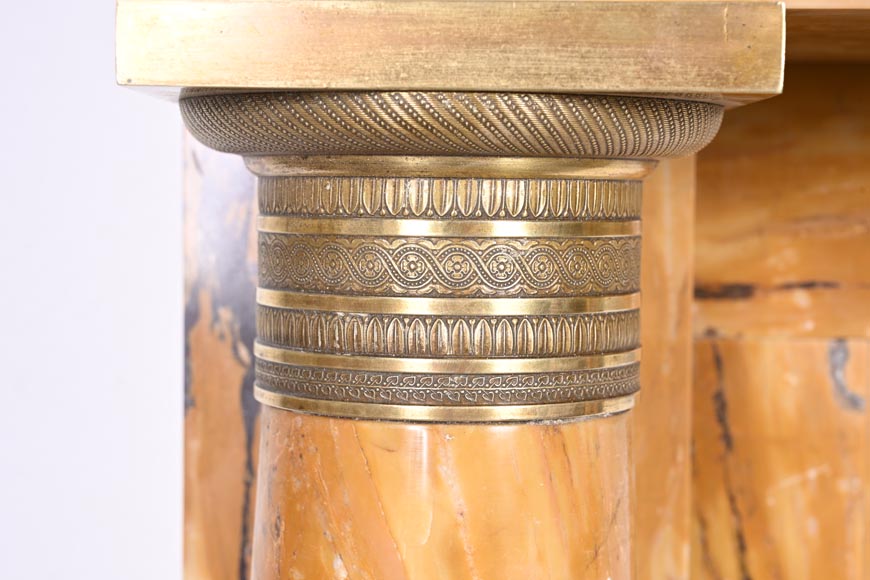 Empire style fireplace in Sienna yellow marble with columns and gilt bronze rosettes Empire style fireplace in Sienna yellow marble with columns and gilt bronze rosettes-5