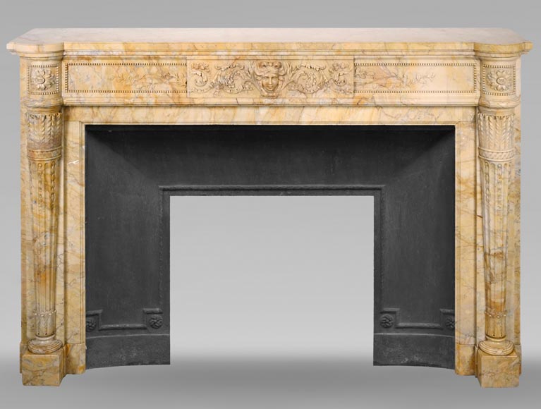 Large Louis XVI style mantel in yellow Sienna marble with entablature adorned with the head of Apollo and arrow heads on the jambs Large Louis XVI style mantel in yellow Sienna marble with entablature adorned with the head of Apollo and arrow heads on the jambs-0