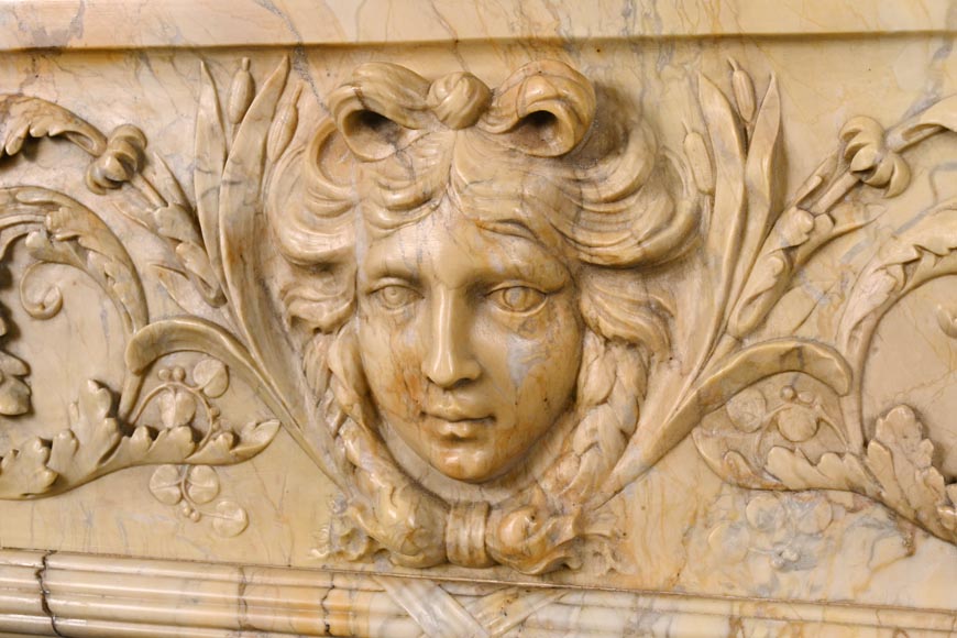 Large Louis XVI style mantel in yellow Sienna marble with entablature adorned with the head of Apollo and arrow heads on the jambs Large Louis XVI style mantel in yellow Sienna marble with entablature adorned with the head of Apollo and arrow heads on the jambs-4