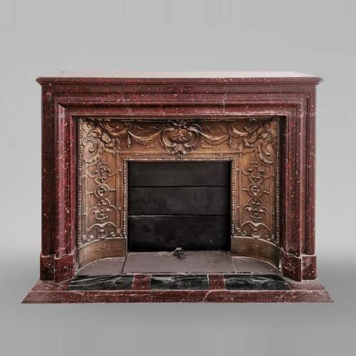 Big antique Louis XIV style fireplace in Red griotte marble