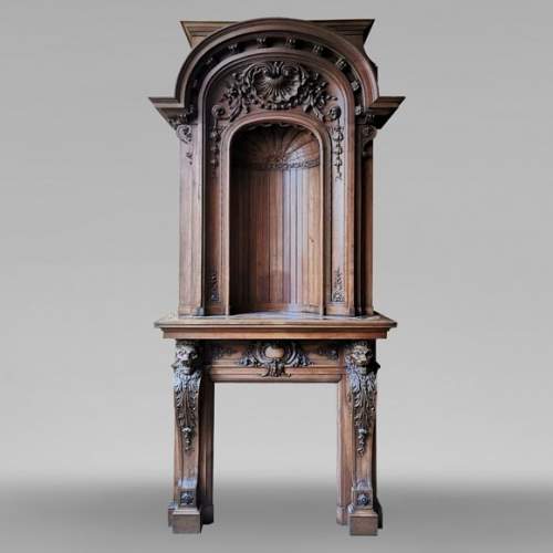 Napoleon III walnut fireplace surmounted by an important alcove
