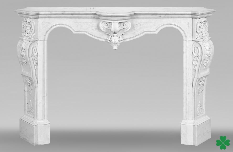 A richly sculpted Carrara marble fireplace in the Napoleon III style, decorated with a lion's head. A richly sculpted Carrara marble fireplace in the Napoleon III style, decorated with a lion's head.-0