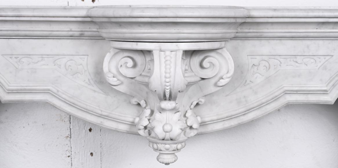 A richly sculpted Carrara marble fireplace in the Napoleon III style, decorated with a lion's head. A richly sculpted Carrara marble fireplace in the Napoleon III style, decorated with a lion's head.-1