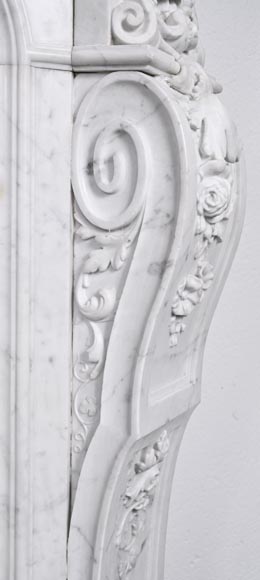 A richly sculpted Carrara marble fireplace in the Napoleon III style, decorated with a lion's head. A richly sculpted Carrara marble fireplace in the Napoleon III style, decorated with a lion's head.-11