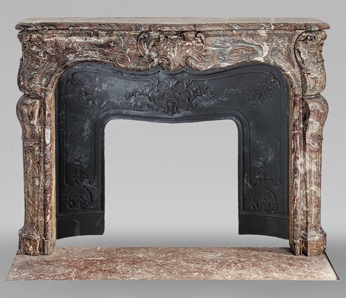 Louis XV period mantelpiece in Royal Red marble decorated with asymmetrical cartouches Louis XV period mantelpiece in Royal Red marble decorated with asymmetrical cartouches-0
