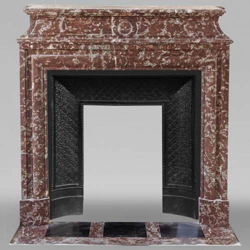 Louis XIV style mantel in Red of the North marble