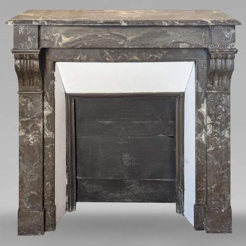 Napoleon III style mantel with modillions in Rouge du Nord marble