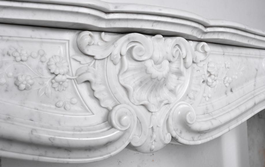 Louis XV style fireplace in Carrara marble, decorated with a floral shell motif Louis XV style fireplace in Carrara marble, decorated with a floral shell motif-2