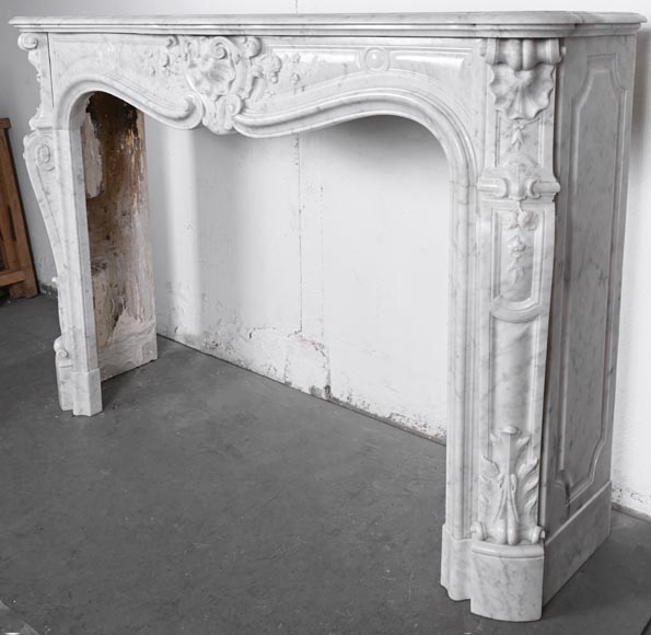 Louis XV style fireplace in Carrara marble, decorated with a floral shell motif Louis XV style fireplace in Carrara marble, decorated with a floral shell motif-10