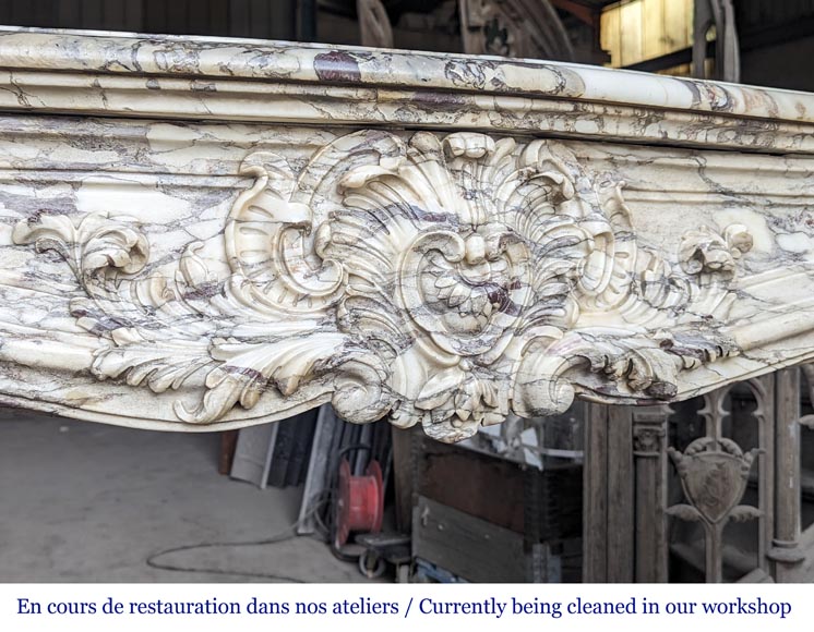 Large Regency-style mantel richly carved in violet breche marble Large Regency-style mantel richly carved in violet breche marble-2