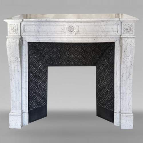 Louis XVI style mantel in Carrara marble adorned with a sunflower
