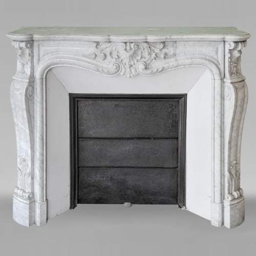 Louis XV style Carrara marble mantel decorated with foliate shells