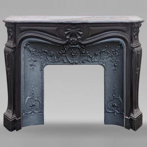 Louis XV style mantel with carved shell in fine black marble