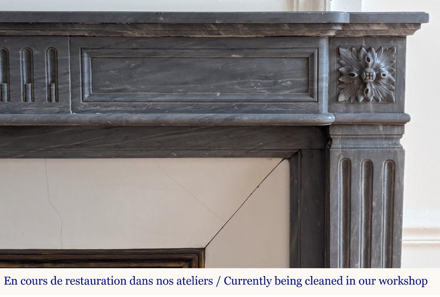 Louis XVI style mantel with curved flutes adorned with rosettes carved in Turquin marble Louis XVI style mantel with curved flutes adorned with rosettes carved in Turquin marble-6