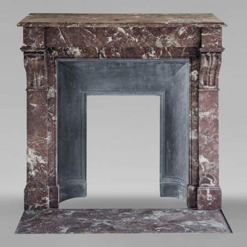 Napoleon III style mantel with modillions in Rouge du Nord marble