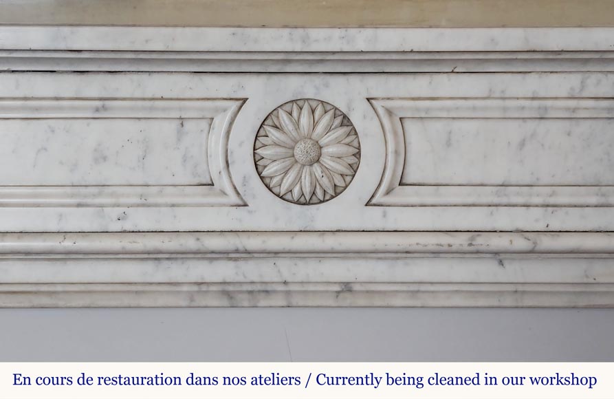 Louis XVI style Carrara marble mantel with rounded corners adorned with a sunflower flower Louis XVI style Carrara marble mantel with rounded corners adorned with a sunflower flower-1