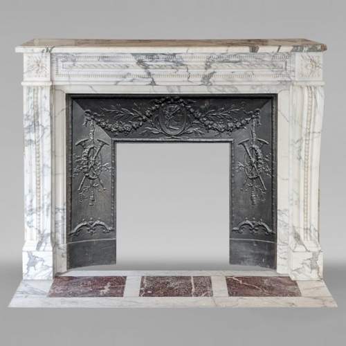Louis XVI style mantel in Arabescato marble decorated with a frieze of pearls