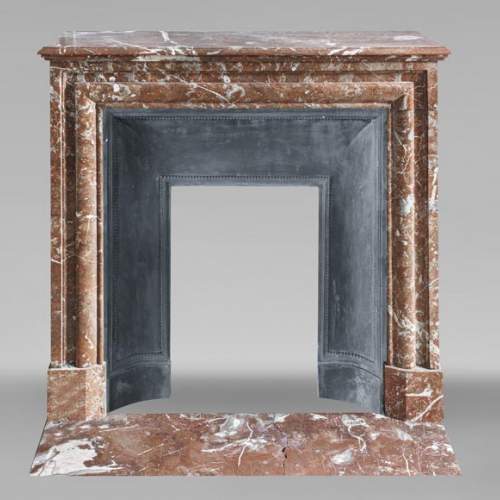 Louis XIV style fireplace in Rouge du Nord marble