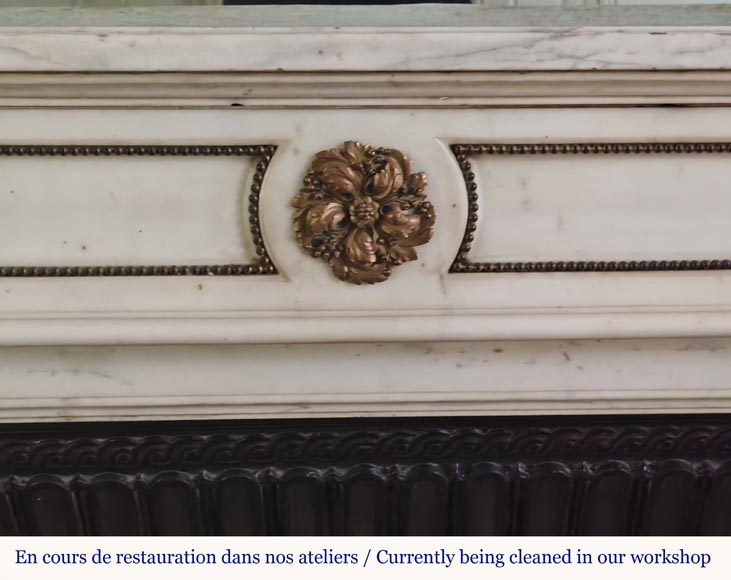 Louis XVI style curved mantel with half columns carved in half statuary marble with bronze décor Louis XVI style curved mantel with half columns carved in half statuary marble with bronze décor-1