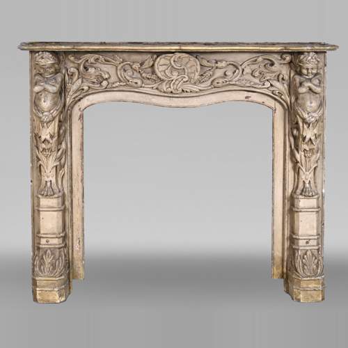 Carved wooden fireplace with putti decoration – Late 18th century
