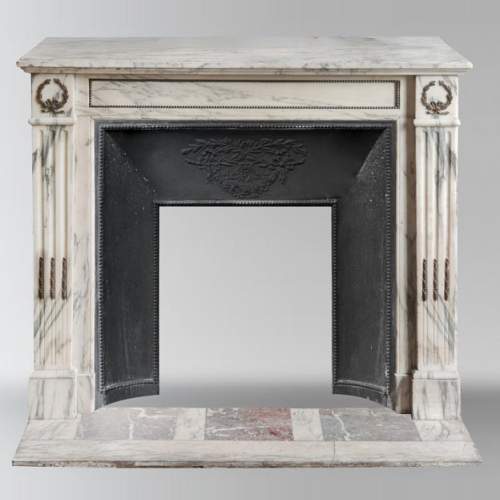 Louis XVI style fireplace with bronze decoration in Arabescato marble