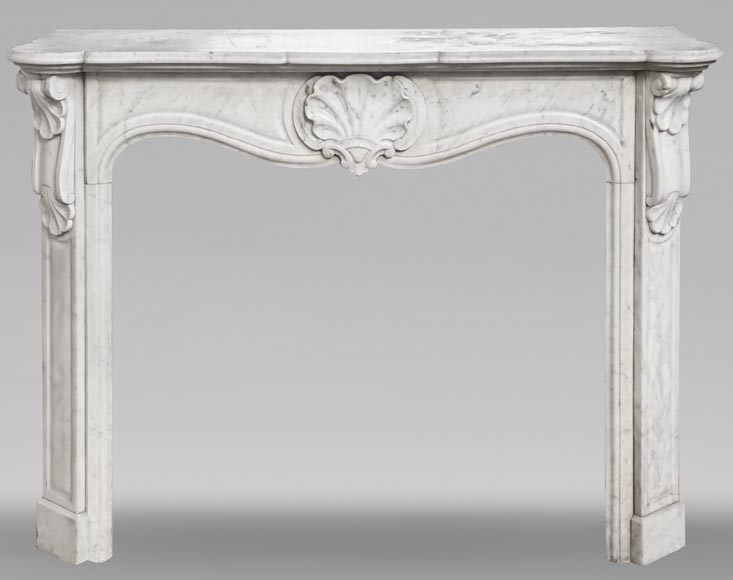 Louis XV style fireplace in Carrara marble decorated with a shell Louis XV style fireplace in Carrara marble decorated with a shell-0