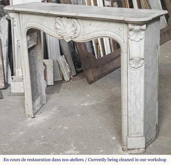 Louis XV style fireplace in Carrara marble decorated with a shell Louis XV style fireplace in Carrara marble decorated with a shell-4