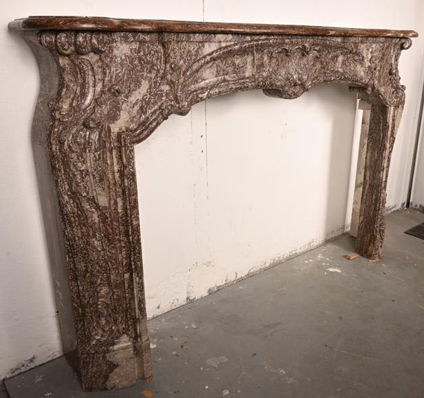 Louis XV period fireplace decorated with an asymmetrical palmette in a variation of Royal Red marble-7