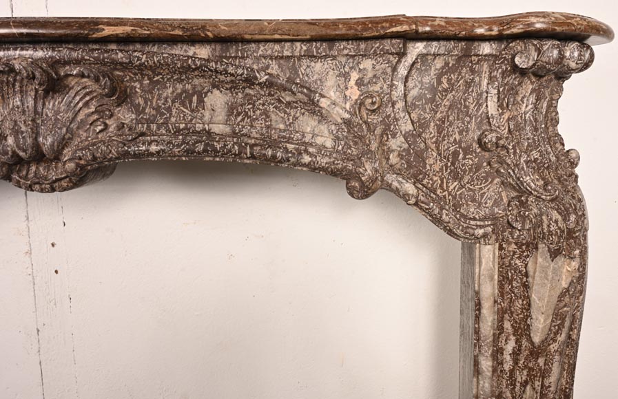 Louis XV period fireplace decorated with an asymmetrical palmette in a variation of Royal Red marble-11