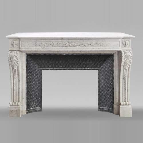 Louis XVI style fireplace in Carrara marble decorated with a bow and a quiver