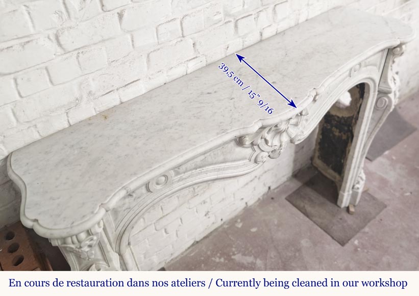 Large Louis XV style fireplace in Carrara marble decorated with shells and flowers Large Louis XV style fireplace in Carrara marble decorated with shells and flowers-9