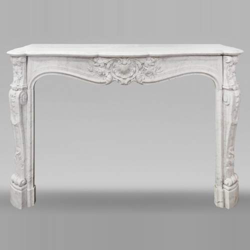Louis XV style fireplace in Carrara marble with plant decoration