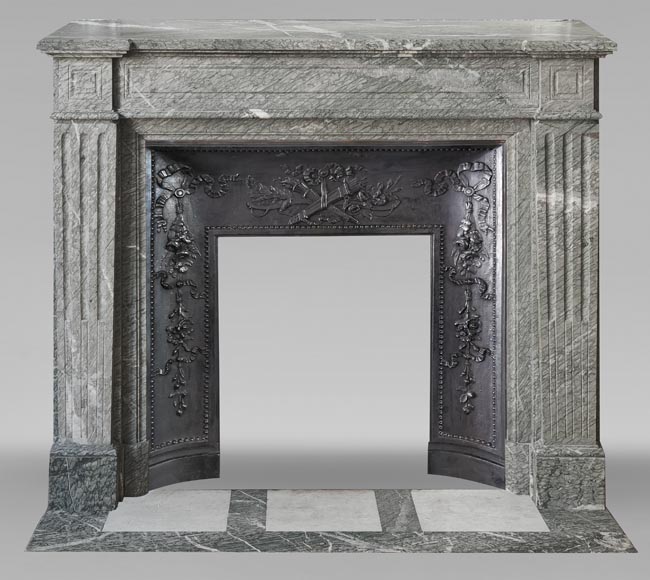 Louis XVI style fireplace with molded decoration, in green Campan marble Louis XVI style fireplace with molded decoration, in green Campan marble-0