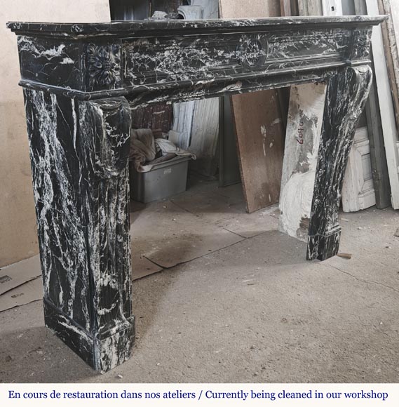 Louis XVI style fireplace decorated with a flower, in black Marquina marble-3