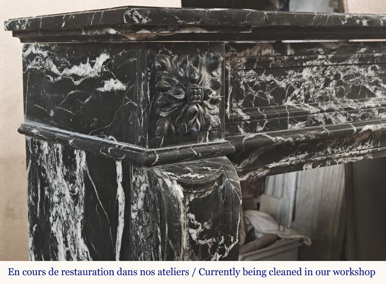 Louis XVI style fireplace decorated with a flower, in black Marquina marble-4