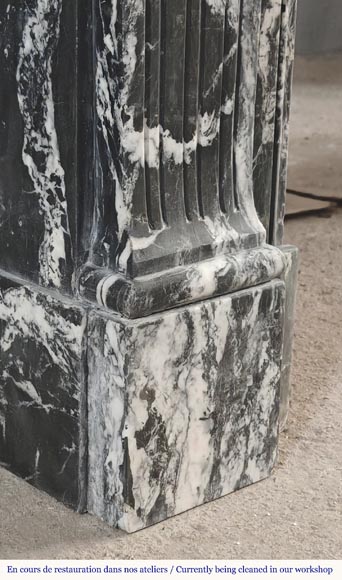 Louis XVI style fireplace decorated with a flower, in black Marquina marble-5
