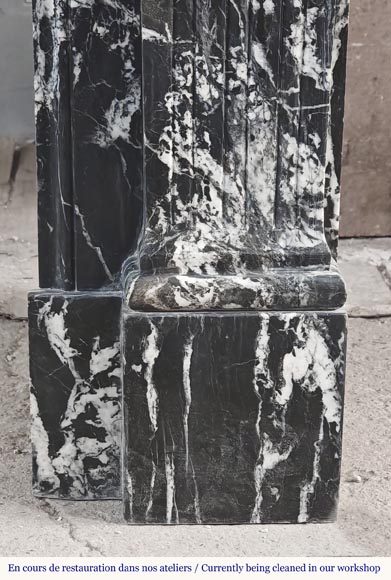 Louis XVI style fireplace decorated with a flower, in black Marquina marble-8