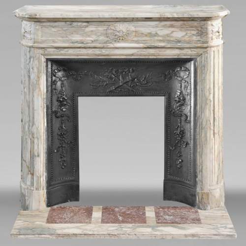 Louis XVI style fireplace with rounded corner, in Médous breccia