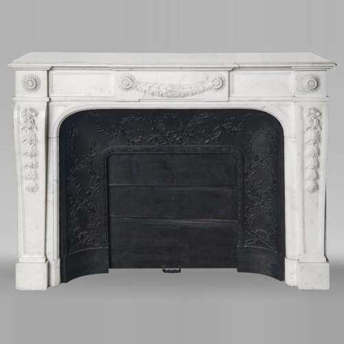 Napoleon III style fireplace in half-statuary marble decorated with a garland