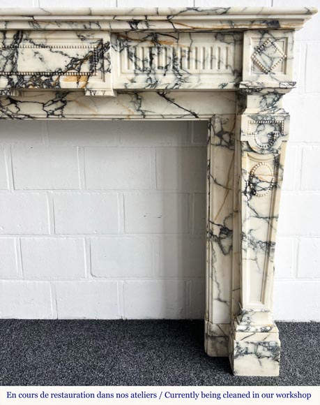 Louis XVI style fireplace in Paonazzo marble, decorated with a pearl frieze-7
