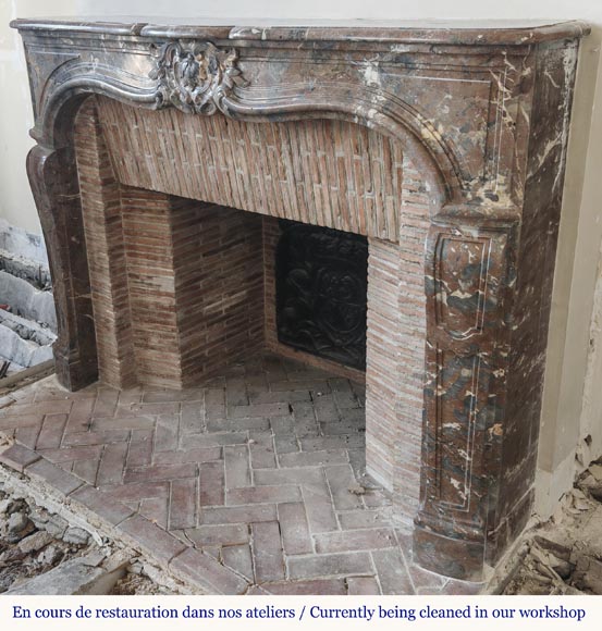 Louis XV period fireplace in Rouge Royal marble, decorated with a shell-5