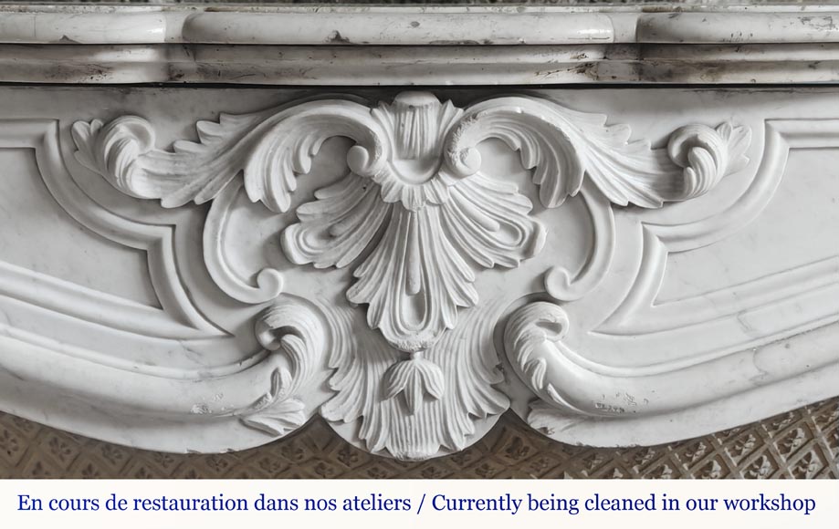 Louis XV style fireplace in Carrara marble, decorated with a palmette Louis XV style fireplace in Carrara marble, decorated with a palmette-1