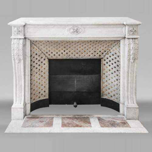 Louis XVI style fireplace in Carrara marble, decorated with acanthus leaves
